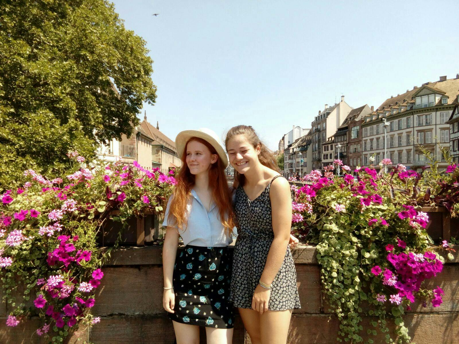 students surrounded by flowers in Germany